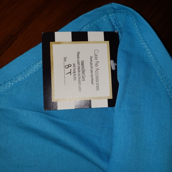 Blue 3/4 sleeve criss cross tunic shirt - Picture 5 of 5